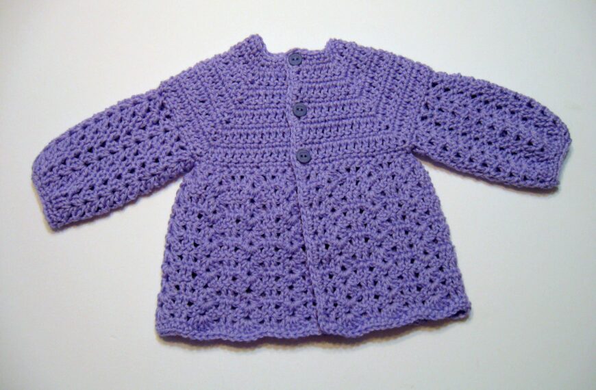 Learn how to create a charming single-crochet baby sweater with our comprehensive step-by-step guide. Perfect for beginners!